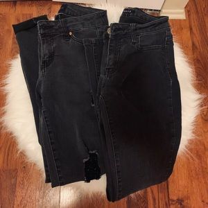 bundle of black jeans